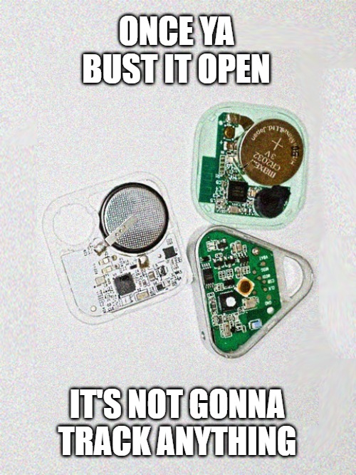 The inside of a bluetooth tracker that's been broken open