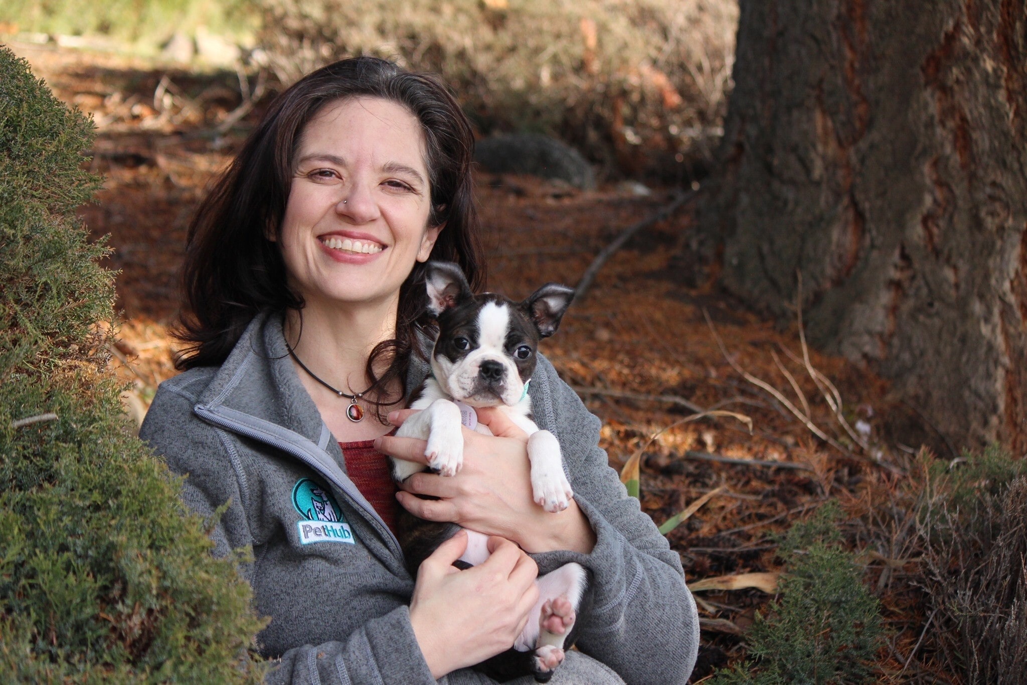 Lorien holding her boston terrier Penny